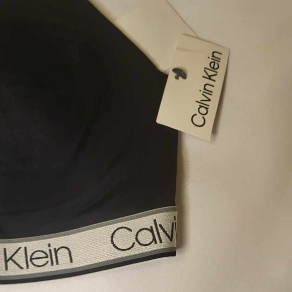 Black Calvin Klein Sport Bra. Gift with a purchase of $75 or more. - Picture 4 of 4